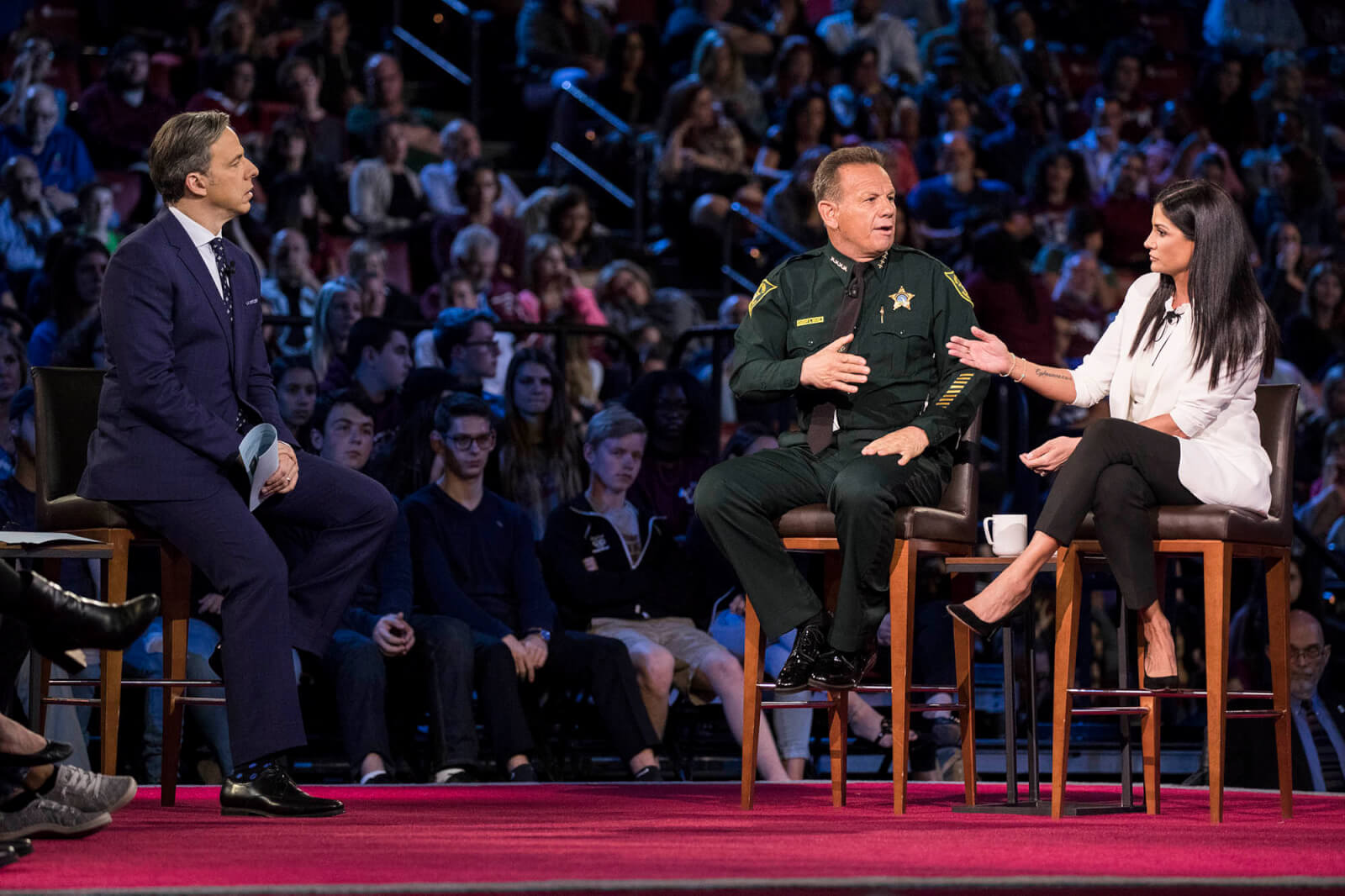 CNN anchor Jake Tapper, Broward County Sheriff Scott Israel and NRA spokesperson Dana Loesch at the CNN Town Hall at the BB&T Center