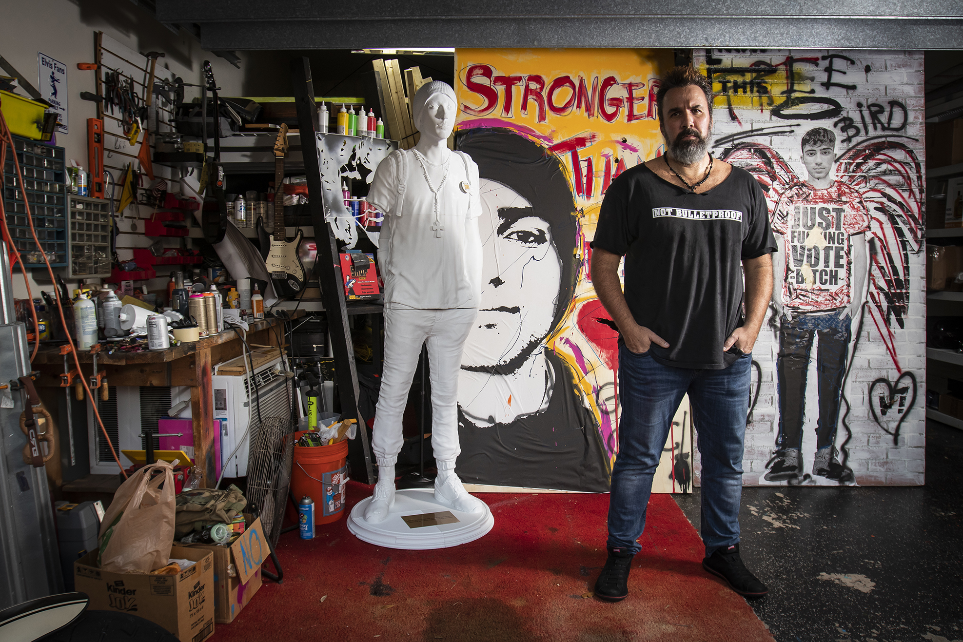 Manuel Oliver inside the art studio at his home on the Coral Springs/Parkland border with works that honor Joaquin— including the 3D replica of his son that he took to Times Square in New York